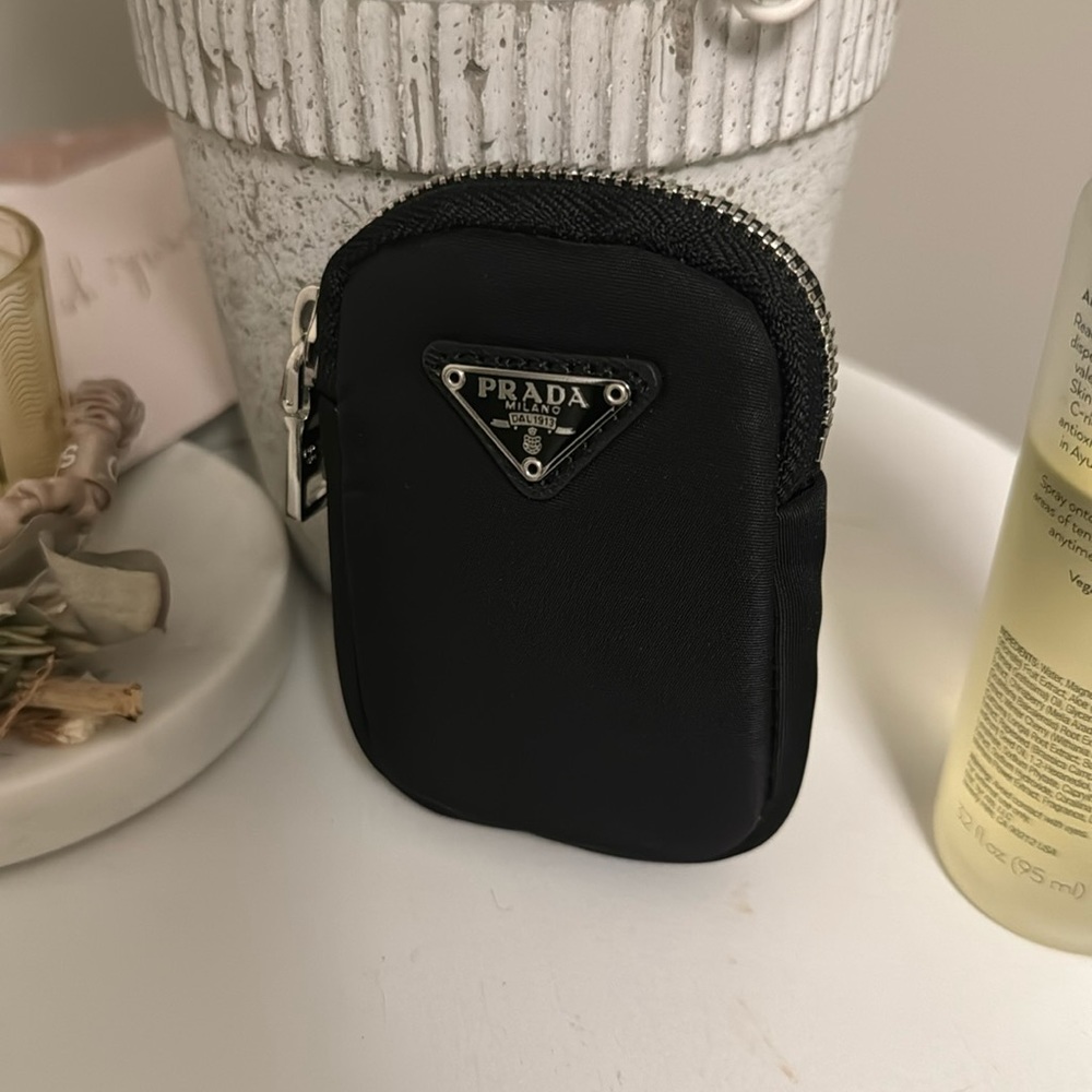 Prada re-nylon mini pouch accessory- authentic- new